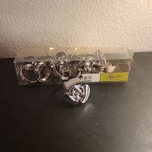 EXCELLENT NEW Galt Silver Tone 7pcs Floral 2" Napkin Rings.